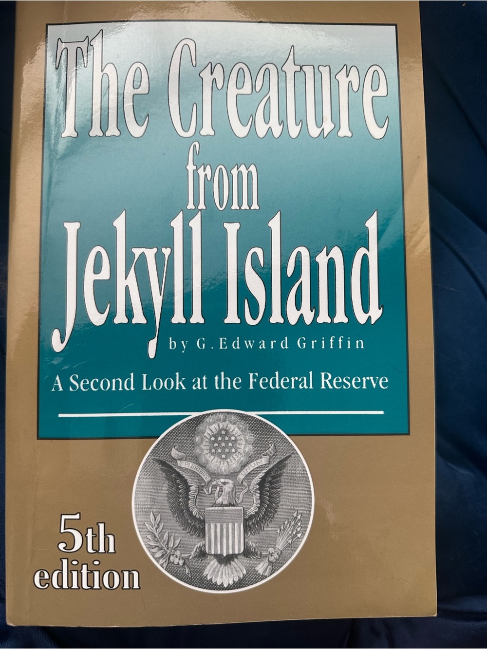 The Creature from Jekyll Island Notebook – Teal and Tan Cover
